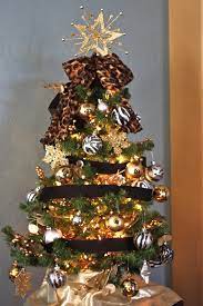 Check spelling or type a new query. Animal Print Inspired Christmas Tree Decorated With Items From Goodwill Thrift L Easy Christmas Decorations Christmas Tree Decorations Christmas Spirit