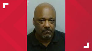 Emory employee faces charges in connection with woman's death