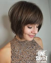 Inverted bob with bangs and layers. Short Brunette Bob With Full Bangs Wavy Bob Hairstyles Choppy Bob Hairstyles Short Bob Haircuts