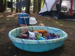 Make Do Play Area For Baby A Baby Pool Makes A Great Play Yard When Camping With An Infant Camping Experience Camping Outfits Camping Supplies
