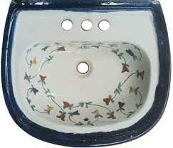 The paint's going to stick. Bathroom Sink Sinaloa Has Predominantly Green Yellow Pattern Painted Over The Rustic White Background Model 2401 Is Decoracion Rustica Banos Cuarto De Bano