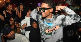 Across his chest a sprawling tattoo reads 'dream chaser'. photograph: Lori Harvey S Boyfriend List The Model Has Dated These Famous Men