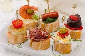 Bite Size Spanish Snacks Stock Image Of Spanish Cuisine Montaditos Sliced Bread Topped With A Variety Of Appetizers Spanish Tapas Two Glasses Of Sherry Wine In The Backg Tapas Food