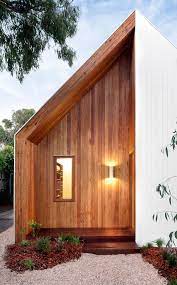 An Extensive Renovation Of A Tiny Weatherboard Beach Shack House Exterior Architecture Modern Small House Design