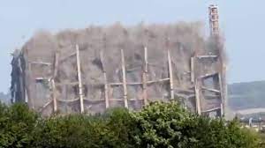 Rugeley power station chimney demolition drone ground video coverage. Footage Shows Power Station Demolished In Rugeley Bbc News
