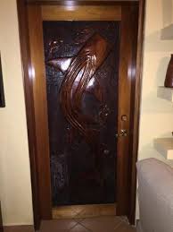 Think you're limited to plain white doors in your bedroom door design? Master Bedroom Door With Whaleshark Carving Picture Of Los Porticos Villas Placencia Tripadvisor