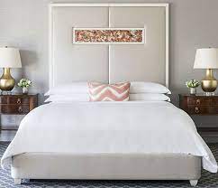 Bedroom with bed and bedding and poster frame mock up on the wall. The Ritz Carlton Hotel Shop Classic White Bedding Set Luxury Hotel Bedding Linens And Home Decor