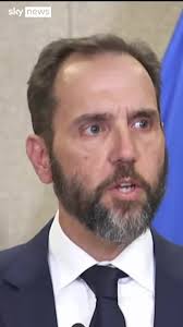 It's a hoax': New charges cannot shake Trump supporters' loyalty