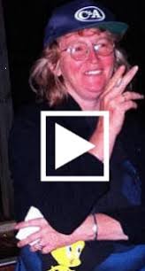 Husband arguing with wife holding baby; Woman Kills Husband And Cooks Him For Children Domestic Violence Katherine Knight