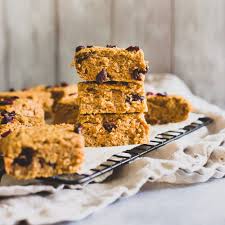These Sweet Potato Bars Made With Oats Are The Perfect Healthy Snack Add Your Favorite Mix Ins Like Dried Fru Potato Bar Stuffed Sweet Potato Healthy Oat Bars