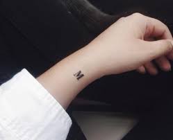 Browse our catalog or create your own cool tattoo idea and get inked by experienced staff. Tiny Tattoos Small Letter On Your Wrist Tiny Wrist Tattoos Small Wrist Tattoos Meaningful Tattoos