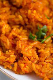 Spicy Jollof Rice With Tomatoes Nigerian Food Nigerian Food Jollof Rice Nigerian Recipes