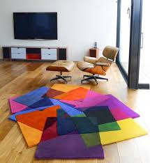Cut the shape of the rug, wrap yarn several times into a ball, and tie on the poms to the mat. 21 Cool Rugs That Put The Spotlight On The Floor