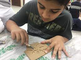 الحفر على الخشب التنفيذ