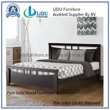 Iron bed and reclaimed wood wall bring plenty of texture to the boys' bedroom [from: China New Product Modern Bedroom Furniture Set Solid Wood Bed For Home Simple Design Wooden Bed Simple Double Bed Design In Woods Dark Color China Wooden Bed Twin Bed