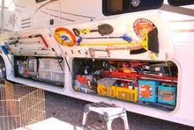 A simple method is to cut a piece of styrofoam to size, then tape it to the window. Rv 201 Modification Of Storage Compartments Camper Storage Rv Storage Rv Camping