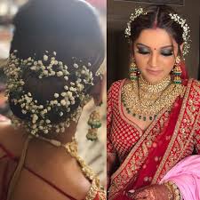 If you're going for a traditional look for your wedding reception there's probably no better hairstyle than a floral bun. Top 85 Bridal Hairstyles That Needs To Be In Every Bride S Gallery Shaadisaga