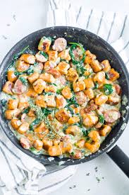 Sweet Potato Gnocchi With A Creamy Vegan Sauce Is Happening Not Only Is This Recipe Vegan But It Sweet Potato Gnocchi Gnocchi Recipes Potato Gnocchi Recipe