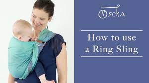 In this video i show you how to do a front carry with your baby's legs out using a ring sling. Using A Ring Sling Oscha Slings