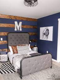 Enjoy a lovely moment in any kids' bedroom just like this eclectic idea from kids rooms. Navy Blue Boys Bedroom Rustic Boys Bedrooms Boys Room Blue Blue Boys Bedroom