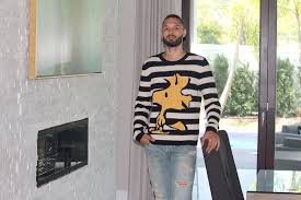 A kitchen straight out of a magazine and a master bedroom that looks like a hotel suite. Evan Fournier Nba Orlando Magic