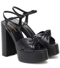 They're crafted in italy from smooth leather and shaped with an ankle tie, front straps and large heel at the back. Bianca Leather Platform Sandals Saint Laurent Mytheresa