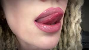 Lip fetish video. Enjoy watching my full, soft, and juicy lips sucking  lolypop