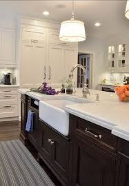 Farmhouse Kitchen Kitchen Island With Farmhouse Sink A Rohl Fireclay Apron Sink Provides Beautiful Contrast Kitchen Design Traditional Kitchen Home Kitchens