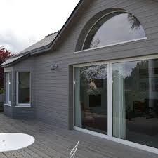 Bardage Et Terrasse En Bois Proteges En Profondeur Par Un Saturateur Teinte Gris Www Traitons D Bardage Exterieur Maison Couleur Facade Maison Bardage Maison