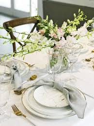 Gather candles and candlesticks, fresh or faux branches, greenery, pinecones, and vegetables and fruits (artichokes, apples, pears, and oranges are especially beautiful on a fall table). Marble And Gold Baptism Decoration Marble And Gold Baptism Decoration A Table To Love