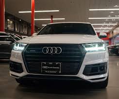 white 2017 q7 in black optics will haul your little squad of storm troopers anywhere audiseattle com audi 2017 dream cars audi audi white 2017 q7 in black optics will haul