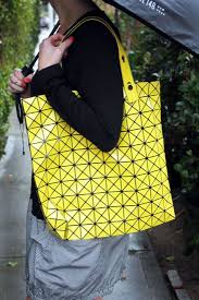 Black And Yellow Totes Bao Bao Bag Issey Miyake Yellow Yellow Bag Lafayette 148 Umbrella Black And White Bubble Bottom Dress Rainy Day Fashio Fashion Fashion Blog Yellow Bag