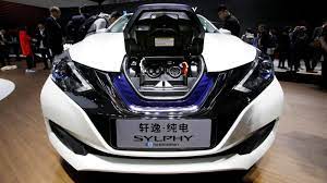 China_auto_show_77551 visitors look at the intelligent car product from baidu's apollo program during the shanghai auto show in shanghai on monday, april 19, 2021. When It Comes To Making Electric Cars There S China And Everyone Else Quartz