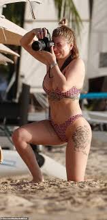 Olivia Buckland flaunts her hourglass curves in a gingham bikini as she  packs on PDA with Alex Bowen | Daily Mail Online