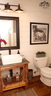 Bright white sinks and shiny chrome light fixtures and faucets keep the look bright and breezy. Diy Small Rustic Bathroom Ideas Trendecors
