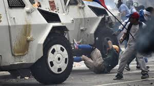 Image result for Armoured vehicle hits Venezuelan protesters