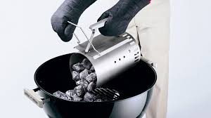 Load the bottom of the chimney starter with balled up newspaper and fill the top of the starter with charcoal briquets. 5 Rookie Mistakes To Avoid When Grilling Over Charcoal Food Wine