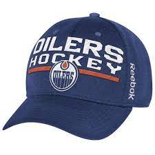 Men S Edmonton Oilers Reebok Royal Center Ice Locker Room Structured Flex Hat Reebok Carolina Hurricanes Reebok Royal