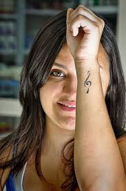 25 Simple Tattoos For Girls Slodive Simple Girl Tattoos Small Music Tattoos Unusual Tattoo