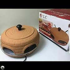 فرن بيتزا المعجنات سريع التحضير يعمل البيتزا و المعجبنات والكاب كيك سريع عدة دقائق فقط يعمل البيتزا في اقل من دقايق يحتوي على ٦ فتحات جانبية مزود ب ٦ shopping