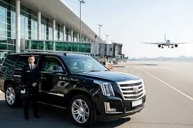 Black Car Waiting at Airport Curb
