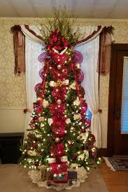 Especially these decorative mesh ones which make your front door unique instead of the traditional green ones! My Burgundy And Cream Deco Mesh And Wired Ribbon Christmas Tree Ribbon On Christmas Tree Christmas Tree Decorations Mesh Christmas Tree