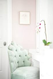 A Celadon Green Chair Sits At A White Make Up Vanity And Complements Pink Walls Green Office Decor Living Room Green Mint Green Furniture
