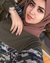 image may contain 1 person closeup hijab fashion fashion girly art