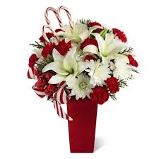 Our fresh crafted same day flowers near me deliver as soon as today. Candy Cane Glory Bouquet At Send Flowers