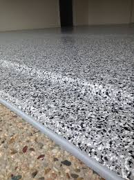 Instead of directly upgrading your concrete floor surface, another viable option is to use interlocking floor tiles in the garage. Sunshine Coast Epoxy Floor Coatings The Garage Floor Co Epoxy Floor Coating Epoxy Floor Floor Coating