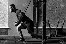 Alice in chains 13.saxon 14. Healthy Lifestyle Good Looking Strong Confident Man Holding Resistance Bands And Doing A Physical Exercise While Having A Gym Workout Stock Photo Picture And Royalty Free Image Image 66797179
