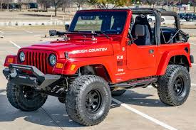 Image result for Flame Red 2005 Jeep