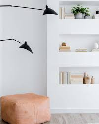 A pop of color is added by throwing a brightly colored rug and a couple of colorful shelves. 19 Minimalist Design Ideas For A Stylish Clutter Free Home Extra Space Storage