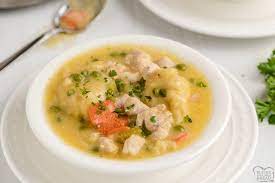 Best Chicken And Dumplings Recipe Butter With A Side Of Bread